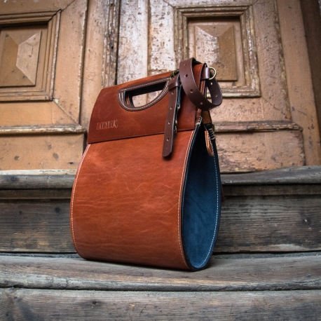the most unique bag in our workshop the tear in beautiful ginger and navy blue colours