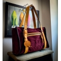 Lili purse made out of soft velour in Burgundy color with leather Camel colored accents