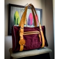 Lili purse made out of soft velour in Burgundy color with leather Camel colored accents