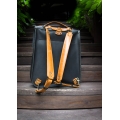 Leather handbag with shoulder strap and backpack function made by hand in two color variations by Ladybuq