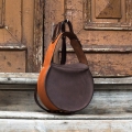 unique shape leather bag made by hand by ladybuq art