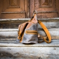 leather handmade backpack in brown and grey color variation made by ladybuq art