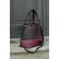 Natural leather handmade bag Alicja in two colors black and purple.