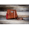 handmade purse out of high quality leather in ginger and red colors