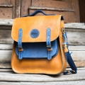 large backpack that can be also worn on shoulder or in the hand in camel and blue colors made by ladybuq
