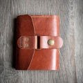 Multifunkctional wallet in ginger color made of natural leather
