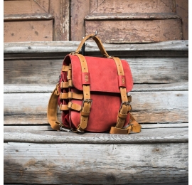 Original oldschool leather backpack in red color with comortable pocket on the back and long strap
