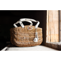 Unique wicker basket with additional white leather items by Ladybuq Art