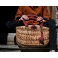 Unique wicker basket with additional red leather items by Ladybuq Art