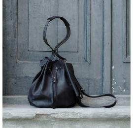 Leather rucksack with a crossbody strap and additional small sachet perfect for small items