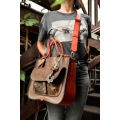 Original leather handbag in brown and red color 