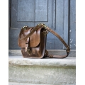 bag and backpack in one handmade out of leather in brown color by ladybuq art